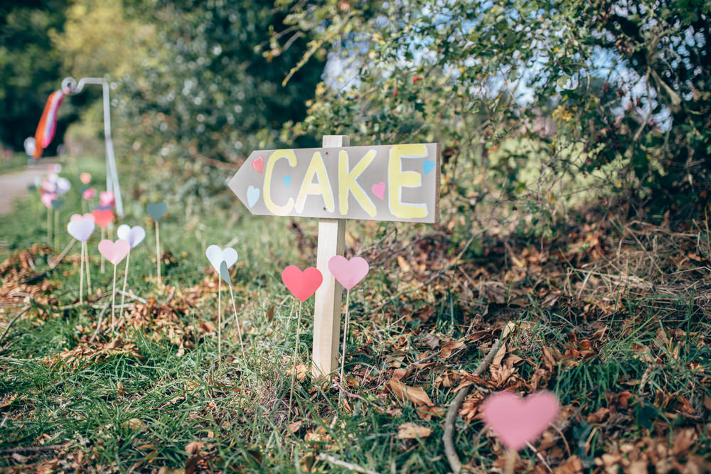 Painted Wooden Sign Post Signage Hearts Sticks Village Hall Wedding Samantha Kay Photography