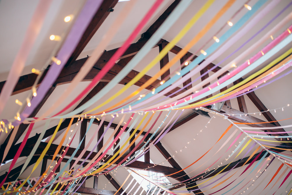 Ribbons Streamers Decor Colourful Ceiling Fairy Lights Village Hall Wedding Samantha Kay Photography