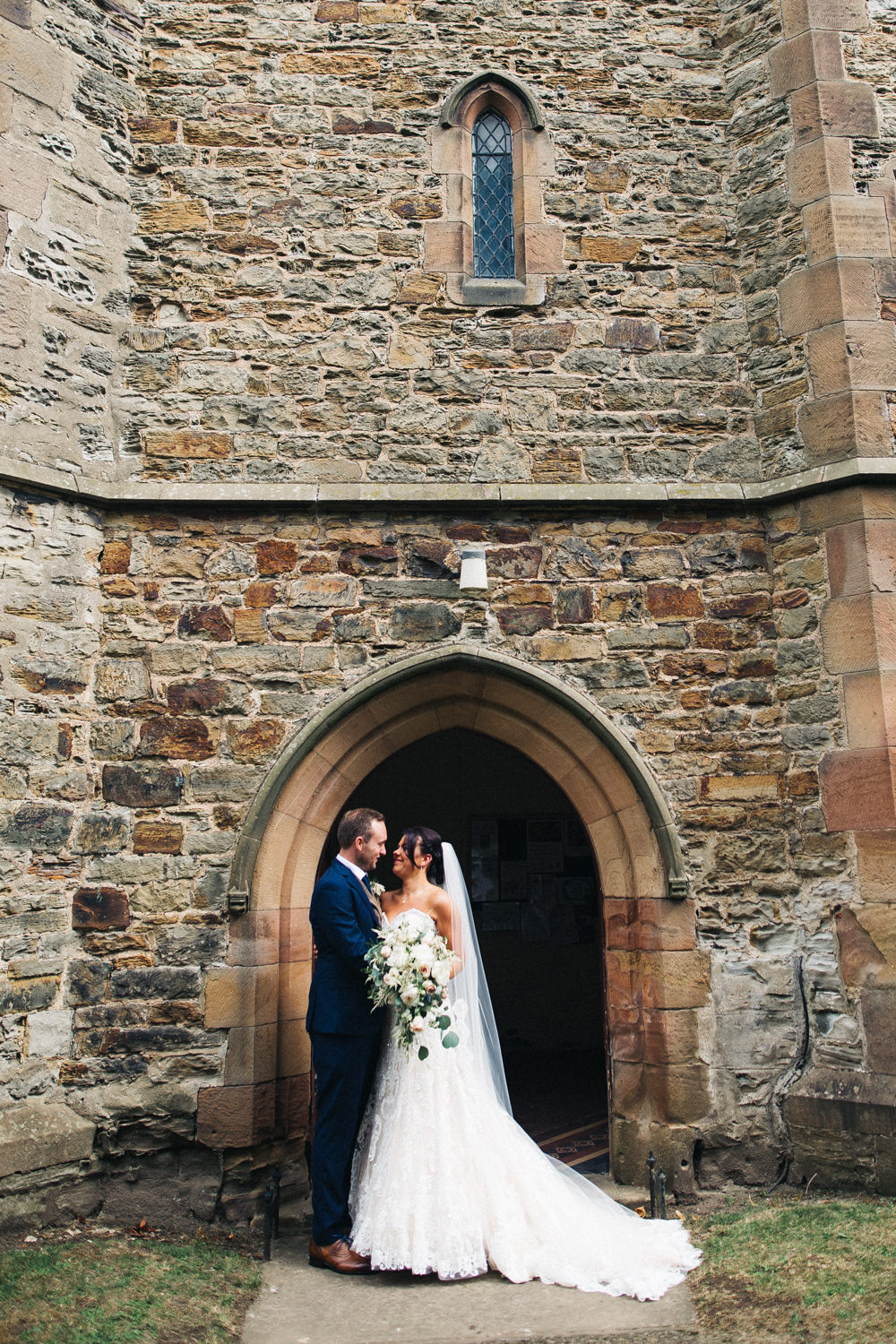 Bride Bridal Sweetheart Neckline Dress Gown Fit Flare Navy Suit Groom Tweed Waistcoat Veil Trailing Bouquet Whinstone View Wedding Sally T Photography