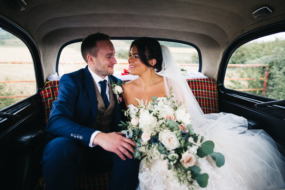 Bride Bridal Sweetheart Neckline Dress Gown Fit Flare Navy Suit Groom Tweed Waistcoat Veil Trailing Bouquet Whinstone View Wedding Sally T Photography