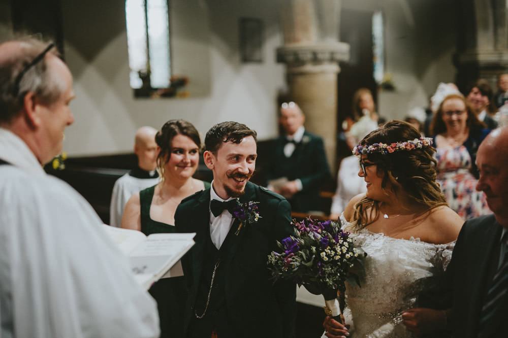 Bride Bridal Lace Sleeves Overlay A Line Dress Gown Kilt Green Jacket Groom Bow Tie Ash Farm Barns Wedding Flawless Photography