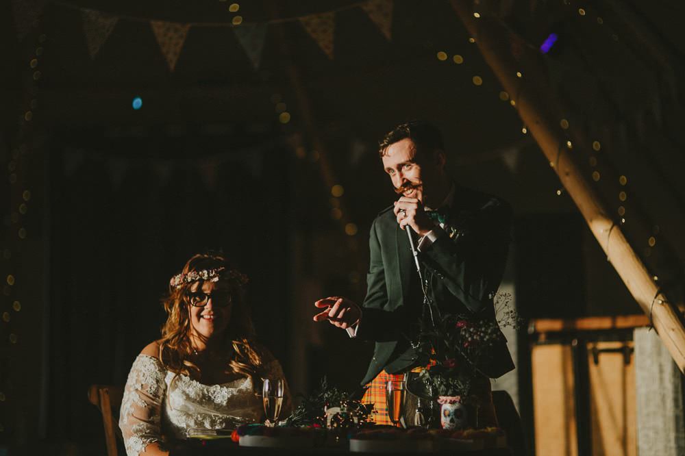 Bride Bridal Lace Sleeves Overlay A Line Dress Gown Flower Crown Kilt Green Jacket Groom Bow Tie Sweetheart Table Bunting Tipi Ash Farm Barns Wedding Flawless Photography