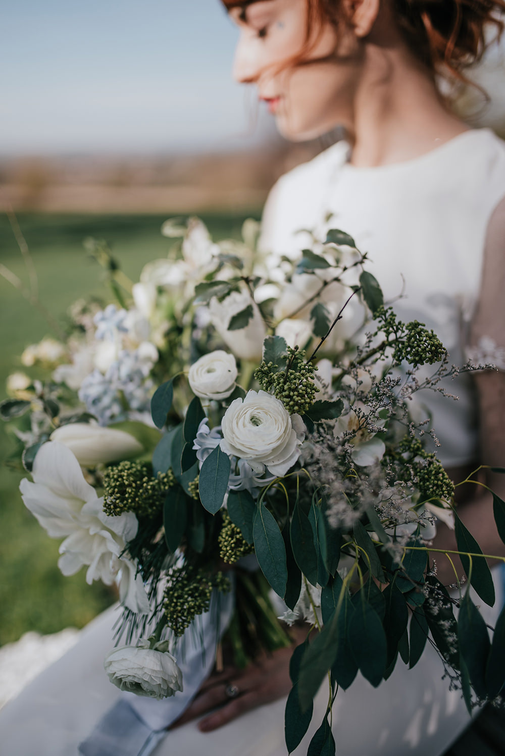 Bride Bridal Bouquet Flowers White Greenery Foliage Ranunculus Blue Wedding Ideas Emma McNair Photography