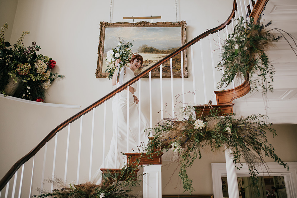 Stairs Staircase Flower Installation Greenery Foliage Arrangement Blue Wedding Ideas Emma McNair Photography