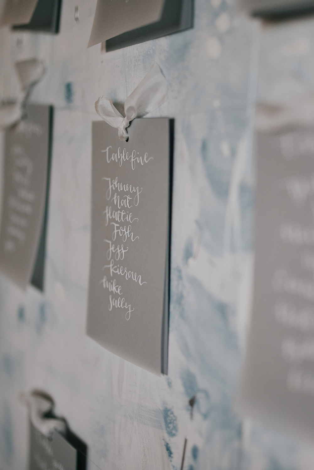 Grey White Calligraphy Seating Plan Table Chart Paint Brush Strokes Blue Wedding Ideas Emma McNair Photography
