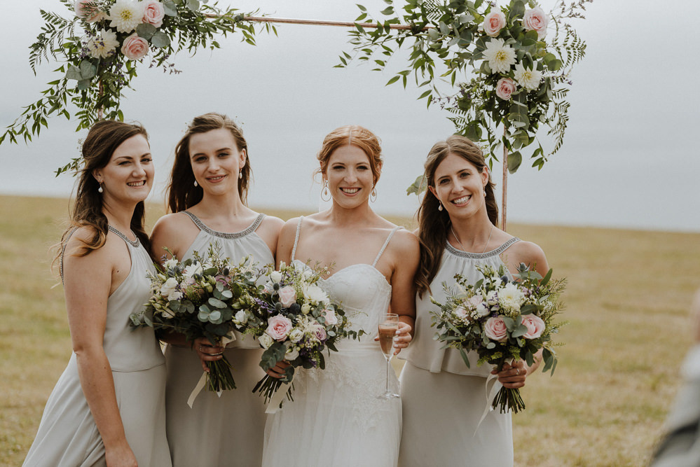 Arch Backdrop Flowers Floral Greenery Bridesmaids Bre Pen Farm Wedding Nick Walker Photography