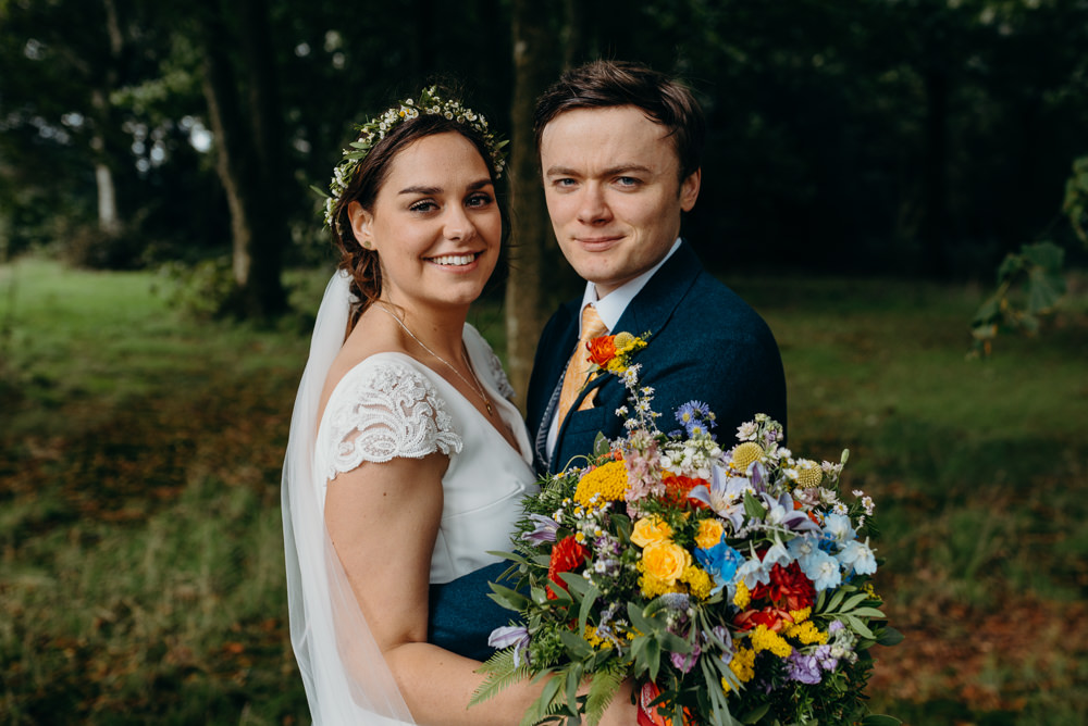 Bouquet Flowers Bride Bridal Rainbow Ribbons Wildflowers Wild Natural Colourful Stretch Tent Wedding Peter Mackey Photography