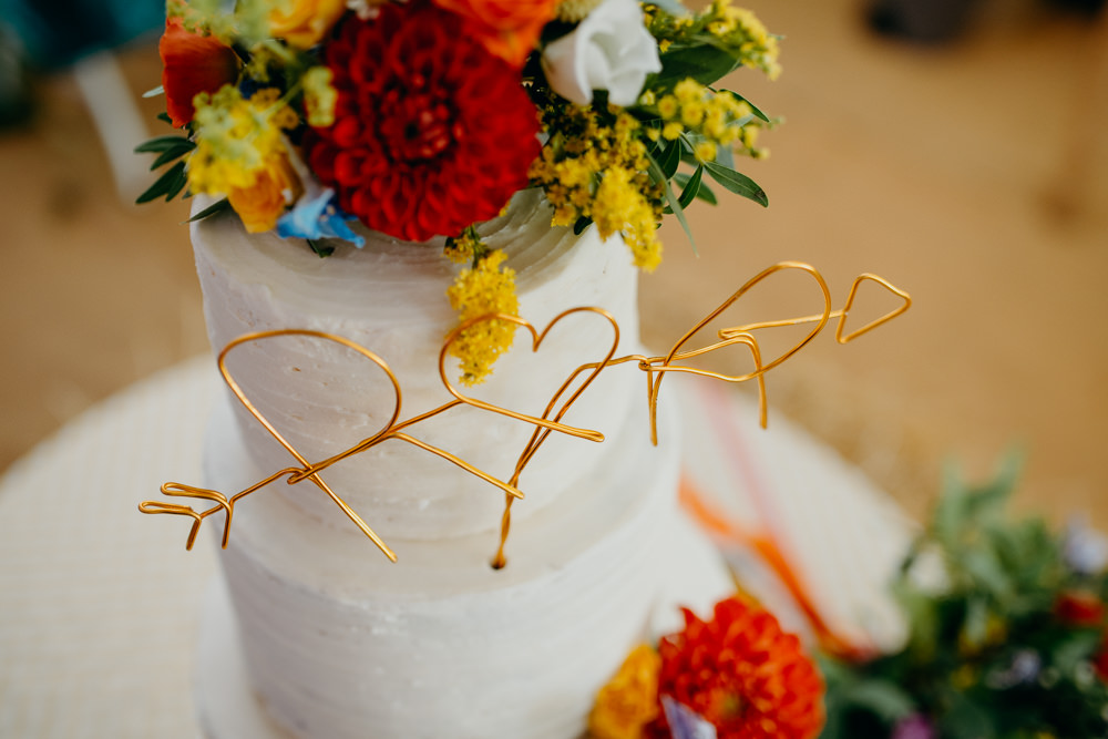 Wire Cake Topper Colourful Stretch Tent Wedding Peter Mackey Photography