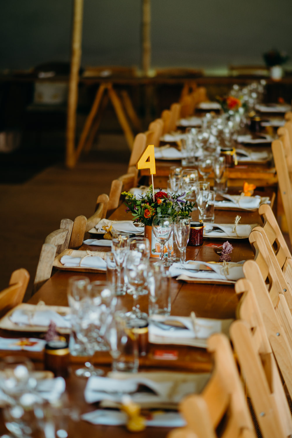 Long Wooden Trestle Tables Decor Colourful Stretch Tent Wedding Peter Mackey Photography