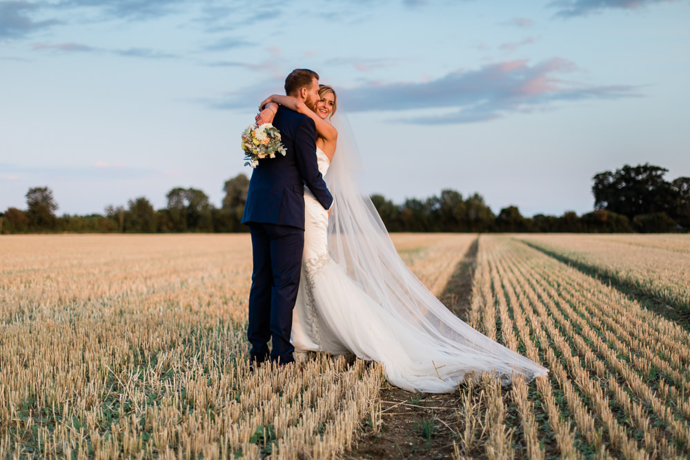 Bride Bridal Sweetheart Neckline Fit And Flare Fishtail Dress Gown Blue Suit Groom Veil Bouquet Creative Summer Wedding Gemma Giorgio Photography