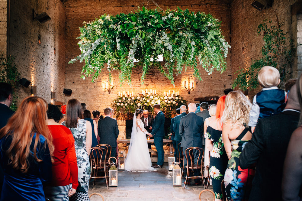 Greenery Foliage Hoop Chandelier Lanterns Aisle Ceremony Cripps Barn Wedding Isobel Murphy Photography