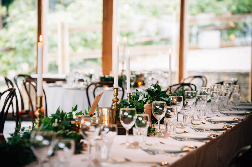 Candle Greenery Foliage Table Flowers Decor Cripps Barn Wedding Isobel Murphy Photography