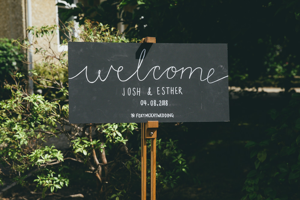 Chalk Black Board Sign Welcome Calligraphy Damerham Village Hall Wedding Lisa-Marie Halliday Photography