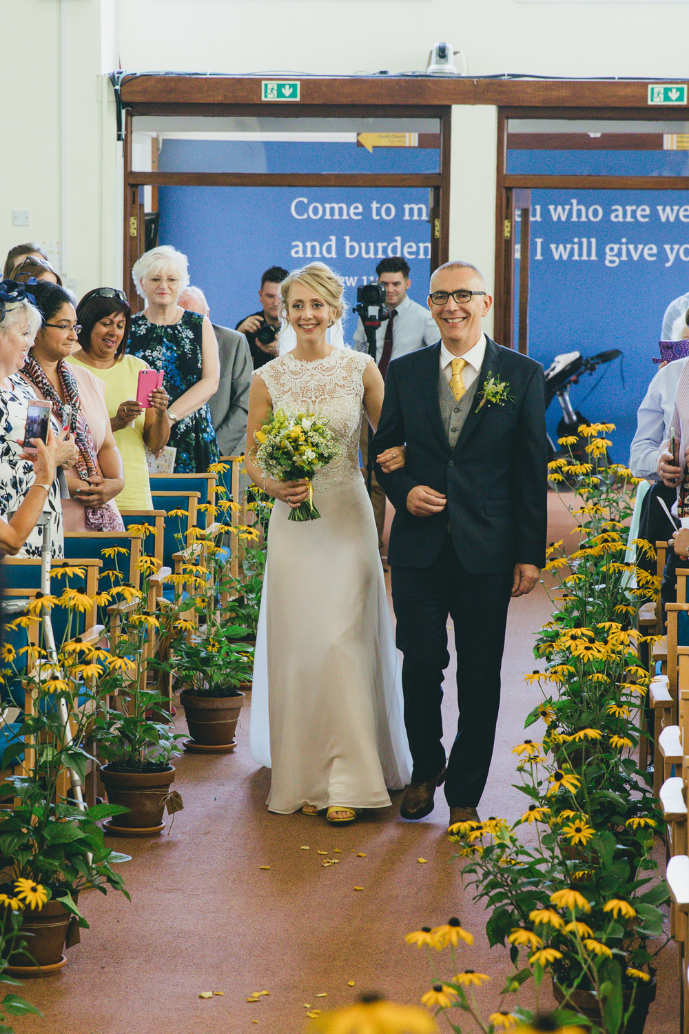 Bunting Yellow Flowers Aisle Ceremony Damerham Village Hall Wedding Lisa-Marie Halliday Photography