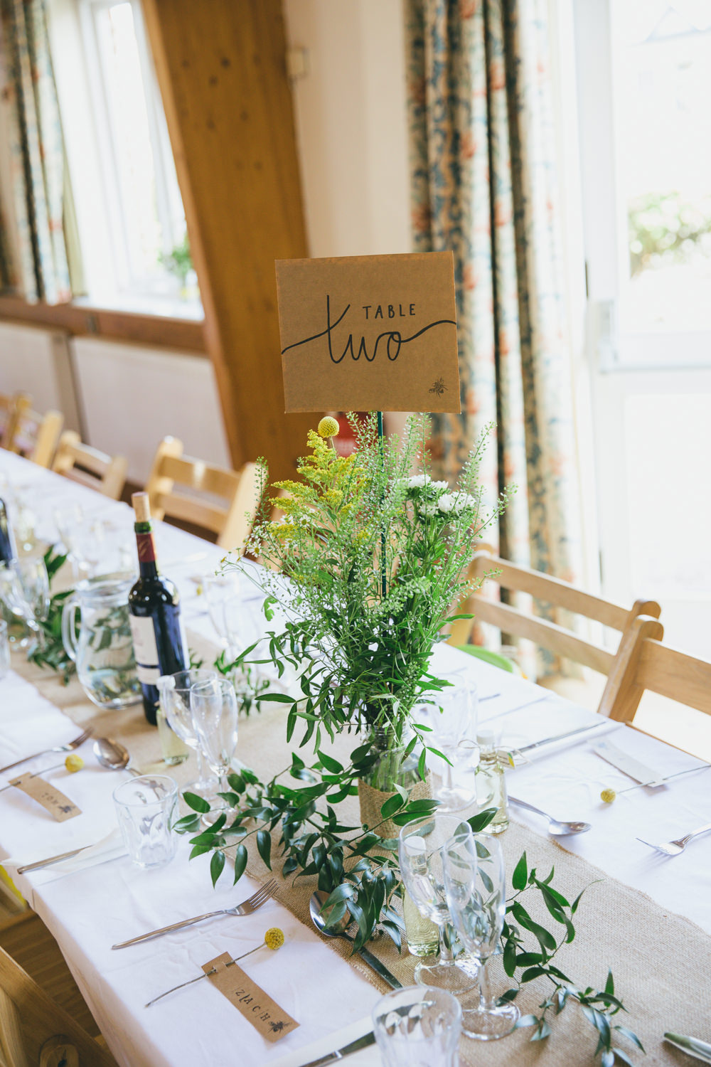 Yellow Bottle Flowers Centrepiece Table Number Damerham Village Hall Wedding Lisa-Marie Halliday Photography