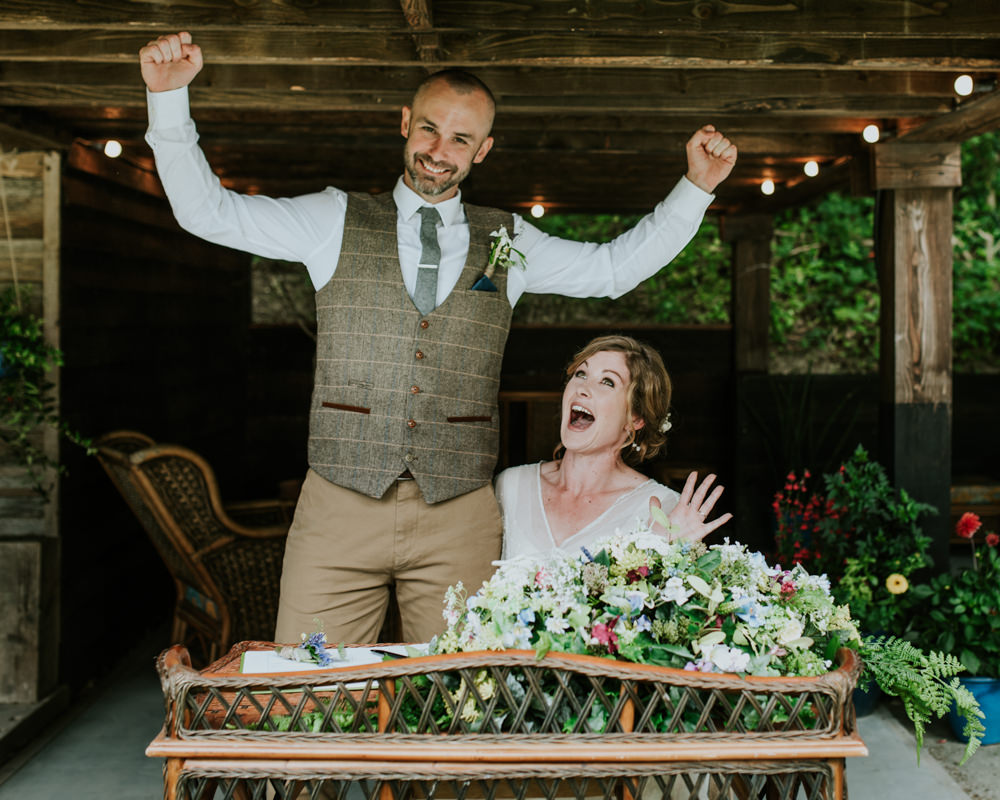 Bride Bridal Vintage Dress V Neck Sleeves Layered Waistcoat Tweed Groom Chinos Registry Table Florals Edwardian Inspired Wedding Daniel Ackerley Photography