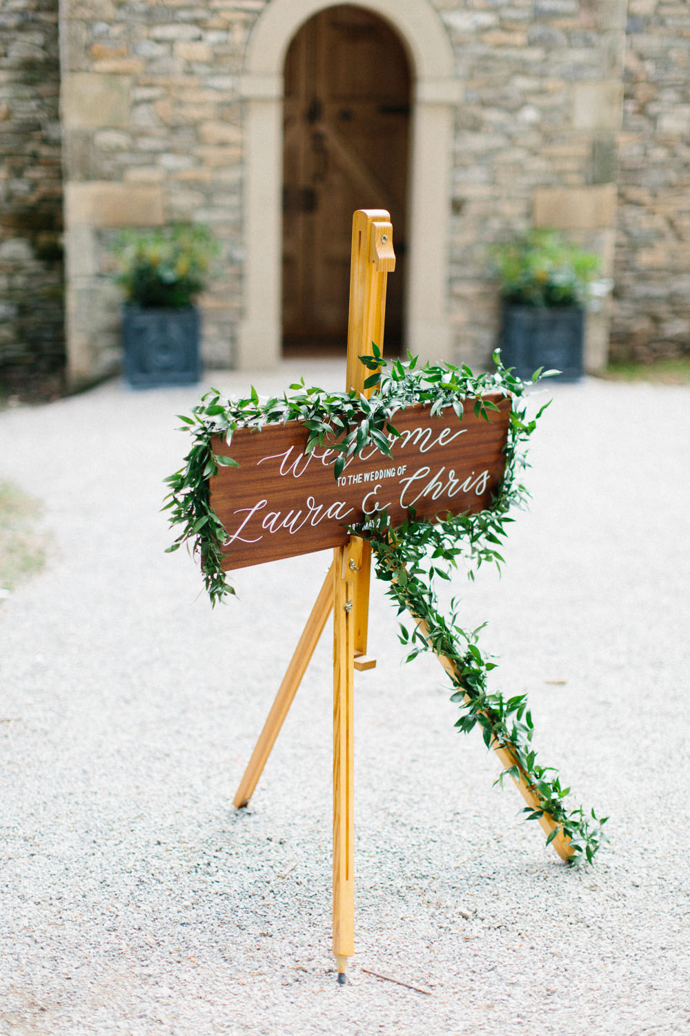 Welcome Sign Wooden Calligraphy Greenery Foliage Easel Garden Ceremony Wedding Melissa Beattie Photography