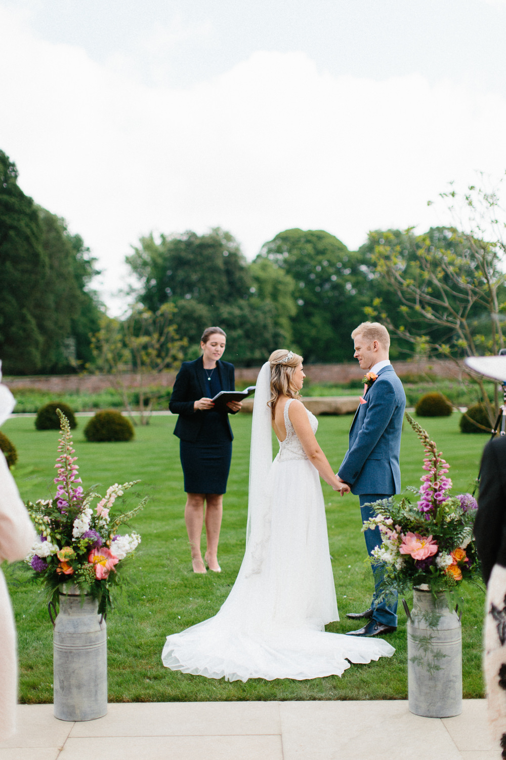 Bride Bridal Dress Sleeveless A Line Beaded Embellished V Neck Tiara Blue Suit Waistcoat Groom Veil Garden Ceremony Wedding Melissa Beattie Photography