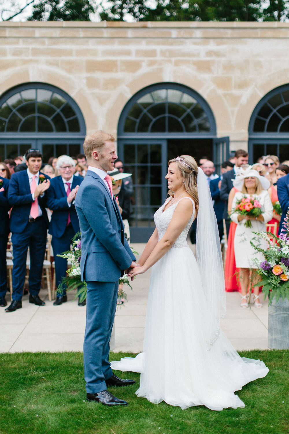 Bride Bridal Dress Sleeveless A Line Beaded Embellished V Neck Tiara Blue Suit Waistcoat Groom Veil Garden Ceremony Wedding Melissa Beattie Photography