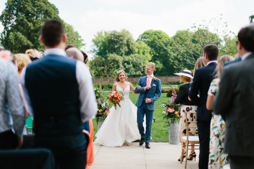 Bride Bridal Dress Sleeveless A Line Beaded Embellished V Neck Tiara Blue Suit Waistcoat Groom Veil Peony Bouquet Garden Ceremony Wedding Melissa Beattie Photography