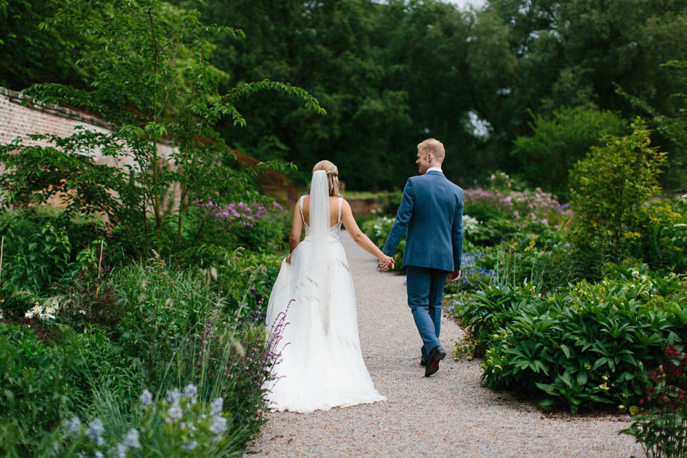 Bride Bridal Dress Sleeveless A Line Beaded Embellished V Neck Tiara Blue Suit Waistcoat Groom Veil Garden Ceremony Wedding Melissa Beattie Photography