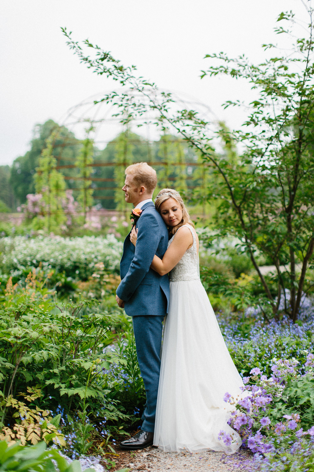 Bride Bridal Dress Sleeveless A Line Beaded Embellished V Neck Tiara Blue Suit Waistcoat Groom Veil Garden Ceremony Wedding Melissa Beattie Photography