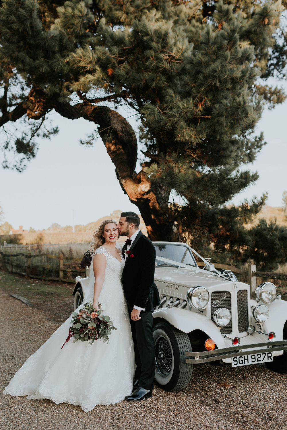 Bride Bridal Cap Sleeve Lace Overlay Dress Gown Veil Velvet Tuxedo Burgundy Bow Tie Groom Bouquet Vintage Car Transport Gaynes Park Wedding Kate Gray Photography