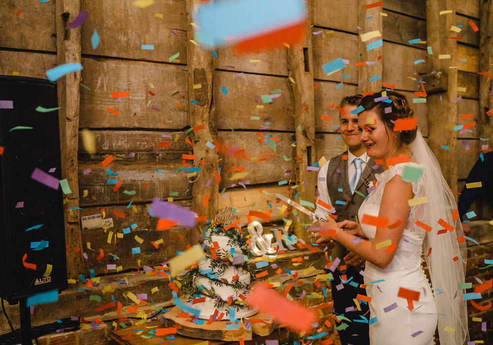 Confetti Cannon Cake Cutting Holkham Hall Wedding Luis Holden Photography