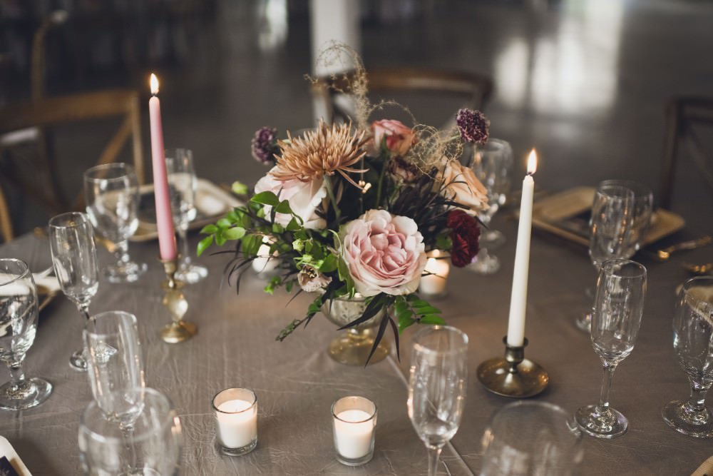 Table Decor Tablescape Flowers Pink Grey Flowers Centrepiece Candles Kindred Barn Wedding The Kindred Collective