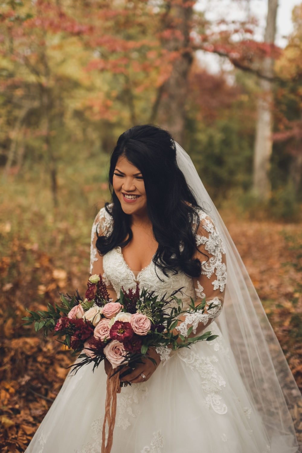 Bouquet Flowers Pink Red Rose Greenery Foliage Bride Bridal Dress Gown Lace Sleeves Train Veil Kindred Barn Wedding The Kindred Collective