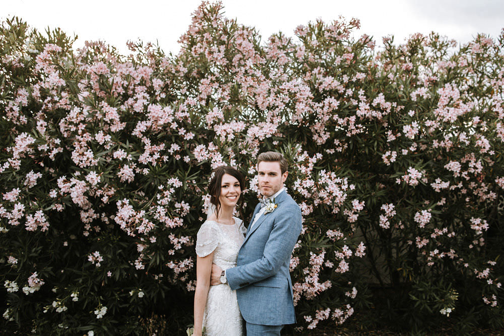 Bride Bridal Jenny Packham Beaded Short Sleeve Dress Gown Blue Suit Groom Bow Tie Hairpiece Veil Portugal Destination Wedding Ana Parker Photography