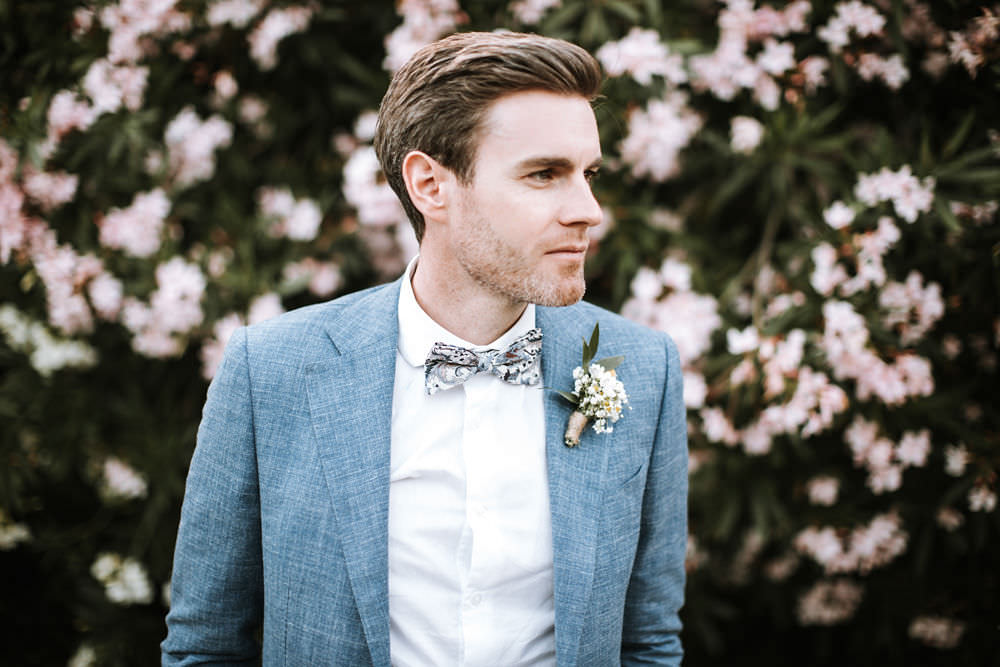 Blue Suit Groom Floral Bow Tie Portugal Destination Wedding Ana Parker Photography