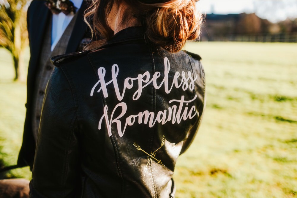 Leather Jacket Bride Bridal Painted Personalised Romantic Wedding Ideas Neon Lighting Kate McCarthy Photography