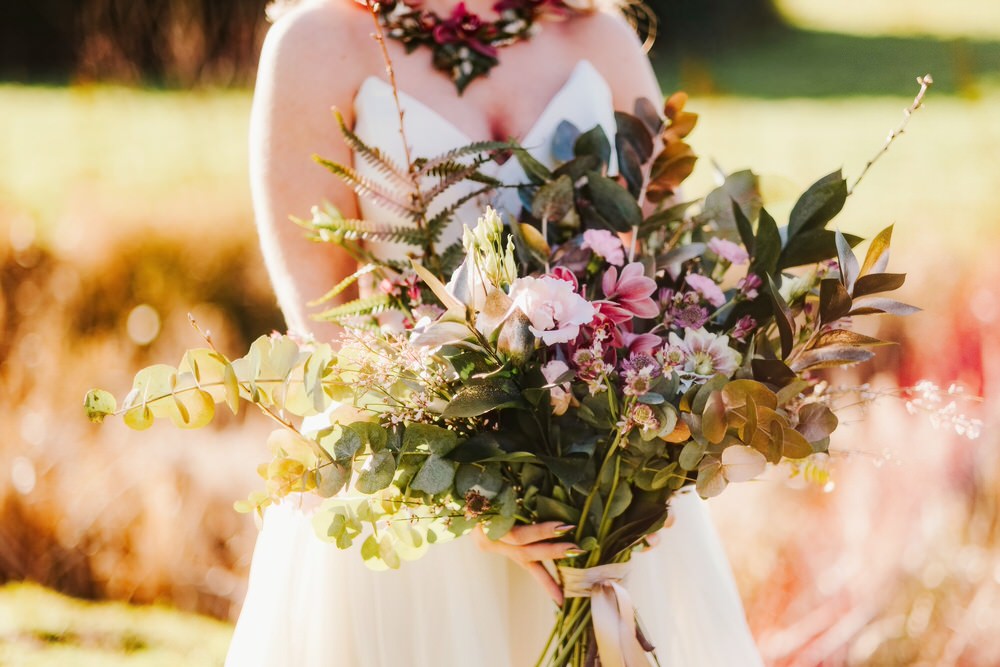 Bride Bridal Bouquet Flowers Large Wild Foliage Greenery Roses Romantic Wedding Ideas Neon Lighting Kate McCarthy Photography