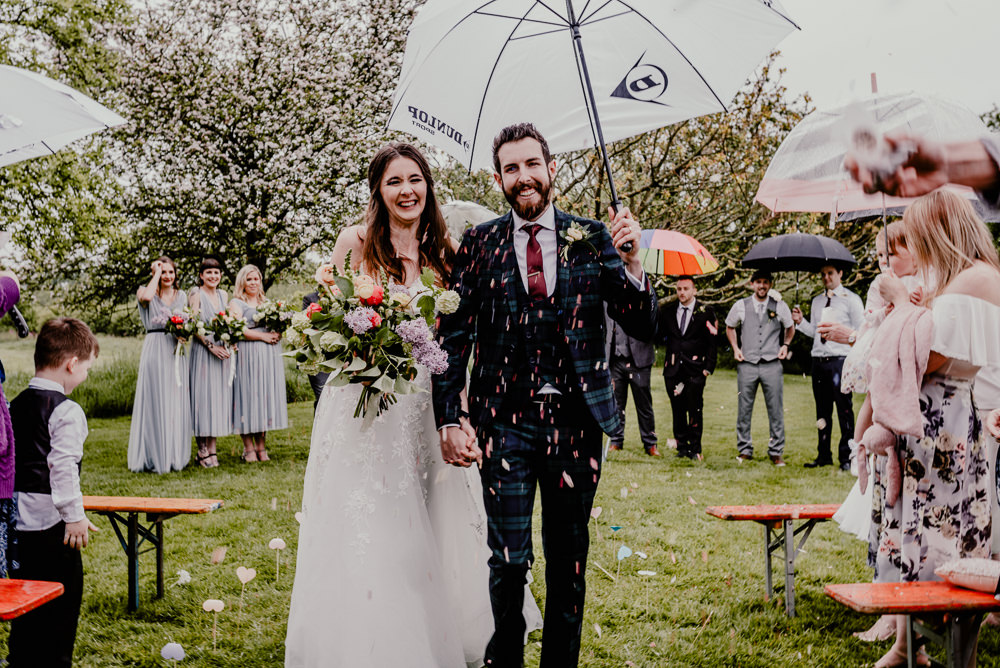 Confetti Throw Rain Rainy Rustic Barn Wedding Louise Griffin Photography
