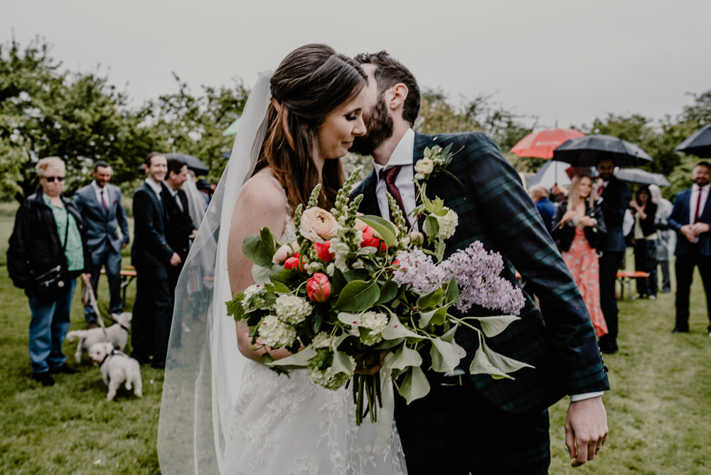 Bouquet Flowers Bride Bridal Greenery Foliage Lilac Ranunculus Rustic Barn Wedding Louise Griffin Photography