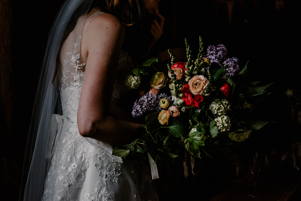 Bouquet Flowers Bride Bridal Greenery Foliage Lilac Ranunculus Rustic Barn Wedding Louise Griffin Photography