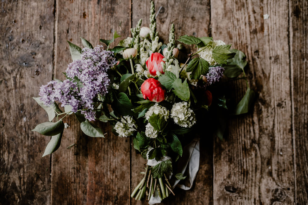 Bouquet Flowers Bride Bridal Greenery Foliage Lilac Ranunculus Rustic Barn Wedding Louise Griffin Photography