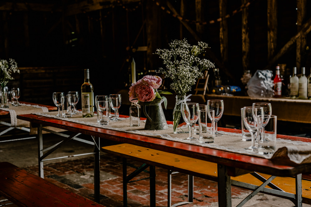 Long Wooden Trestle Tables Jug Flowers Hessian Burlap Rustic Barn Wedding Louise Griffin Photography