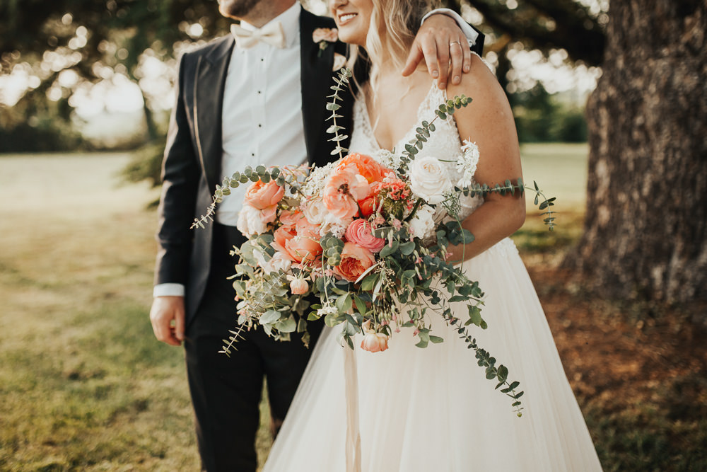 Bride Bridal Bouquet Flowers Coral Peony Peonies Rose Pink Ranunculus Eucalyptus Ribbon Stubton Hall Wedding Darina Stoda Photography