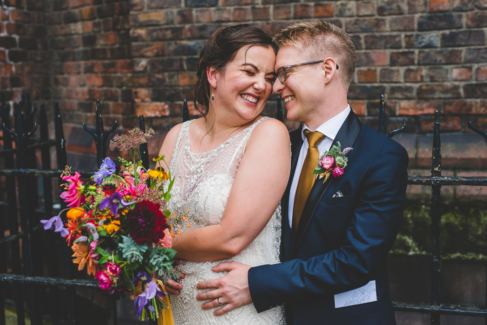 Bride Bridal Beaded Embellished Dress Navy Blue Tuxedo Mustard Tie Groom Multicoloured Bouquet Victoria Gallery Museum Wedding Emma Hillier Photography