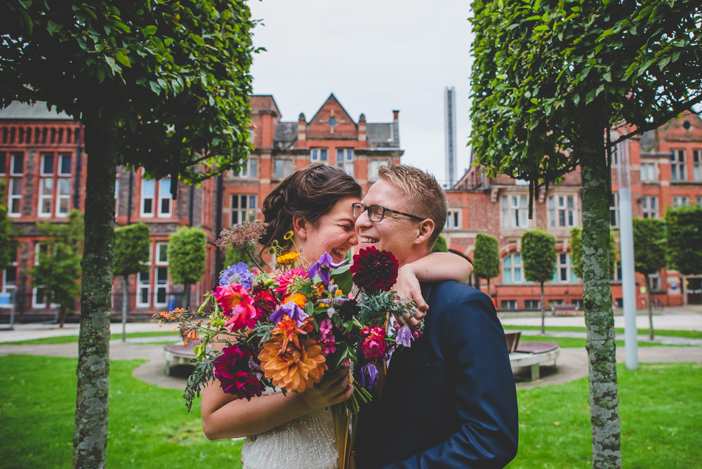 Bride Bridal Beaded Embellished Dress Navy Blue Tuxedo Mustard Tie Groom Multicoloured Bouquet Victoria Gallery Museum Wedding Emma Hillier Photography