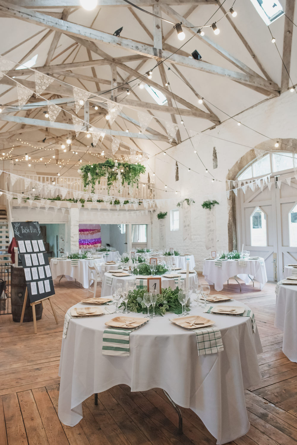 Table Setting Green Napkins Greenery Hoop Bunting Festoon Lighting Wyresdale Park Wedding Lisa Howard Photography