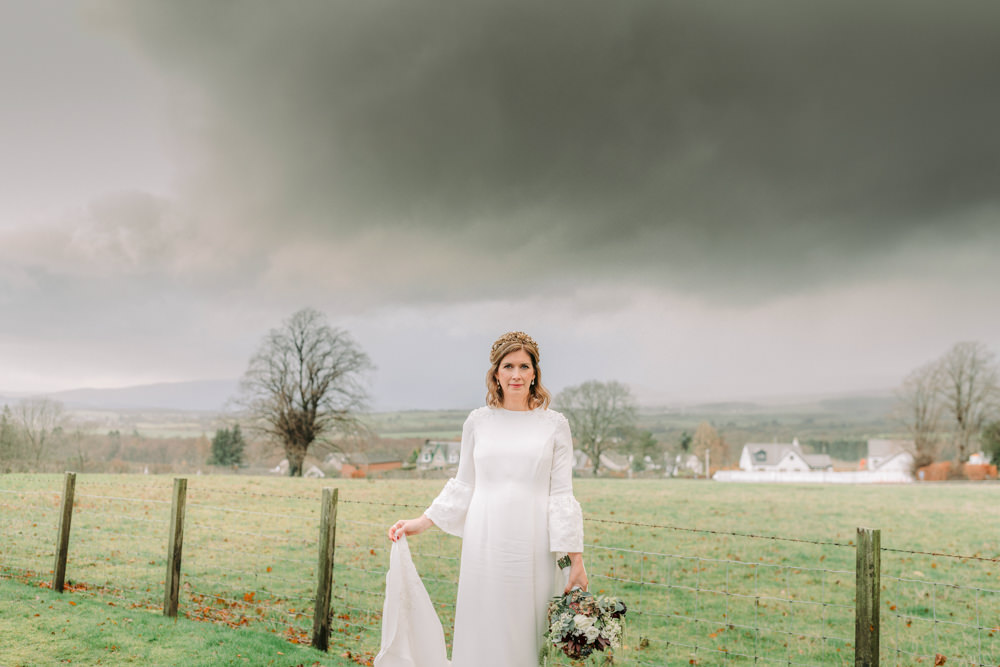Bride Bridal Dress Gown Bell Sleeves Embellished Train Autumn Village Hall Wedding The Gibsons Photography
