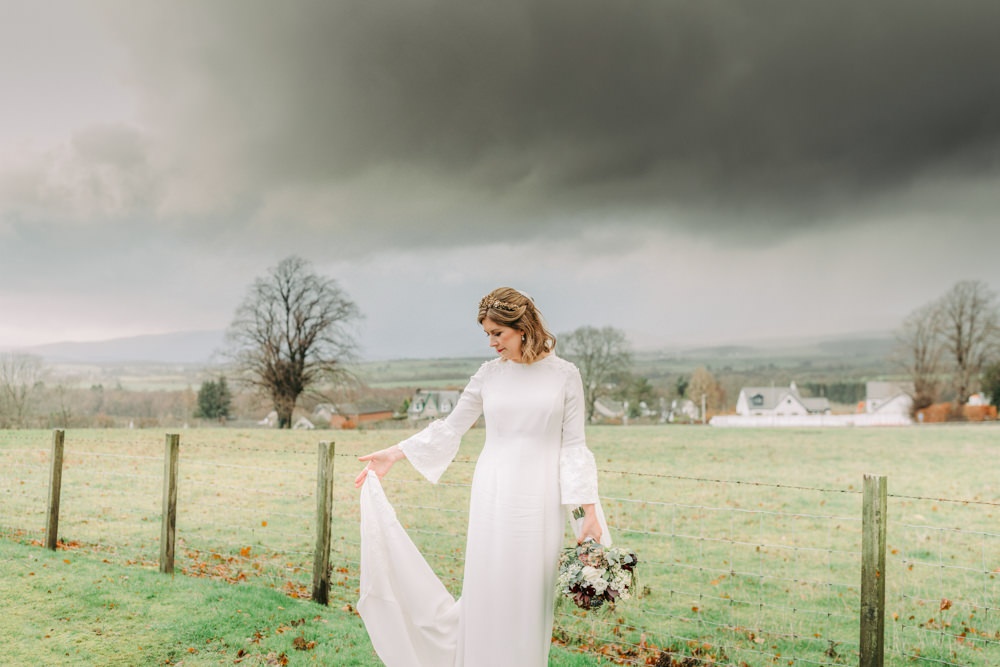 Bride Bridal Dress Gown Bell Sleeves Embellished Train Autumn Village Hall Wedding The Gibsons Photography