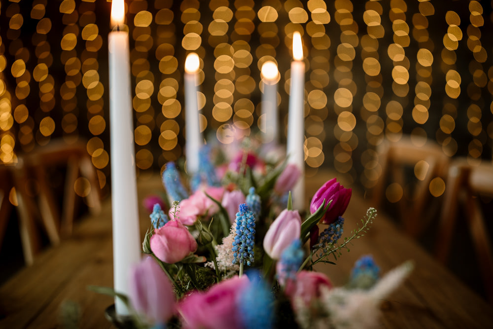 Table Flowers Candles Tablescape Spring Tulips Grape Hyacinths Moss Blossom Barn Wedding Ideas Hayley Baxter Photography