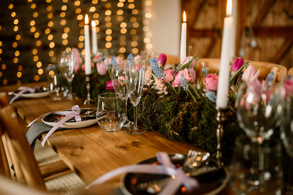 Table Flowers Candles Tablescape Spring Tulips Grape Hyacinths Moss Blossom Barn Wedding Ideas Hayley Baxter Photography