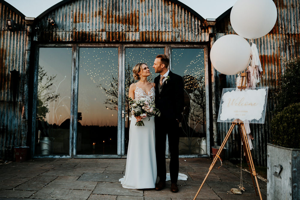 Bride Bridal Sleeveless Strappy Illusion Dress Silk Maxi Slim Separates Floral Tweed Waistcoat Groom Bouquet Welcome Sign Giant Balloons Tassels Tails Contemporary Barn Wedding Ryan Goold Photography
