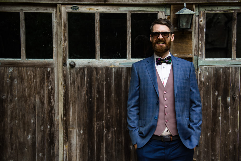 Groom Suit Blue Pink Waistcoat Bow Tie Cotswolds Garden Wedding Jonny Barratt Photography