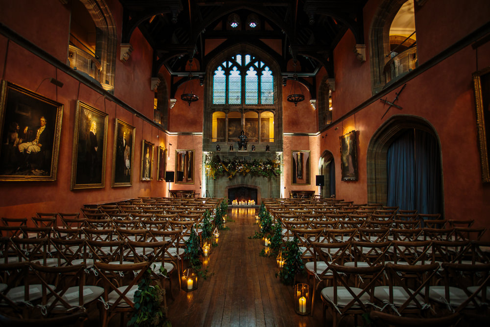Ceremony Aisle Candles Pew End Fireplace Greenery Cowdray House Wedding Matt Sim Photography